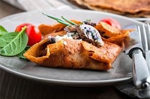 Crêpes con champignon e prosciutto crudo
