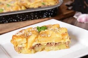 Patate al forno gratinate, prosciutto e brie